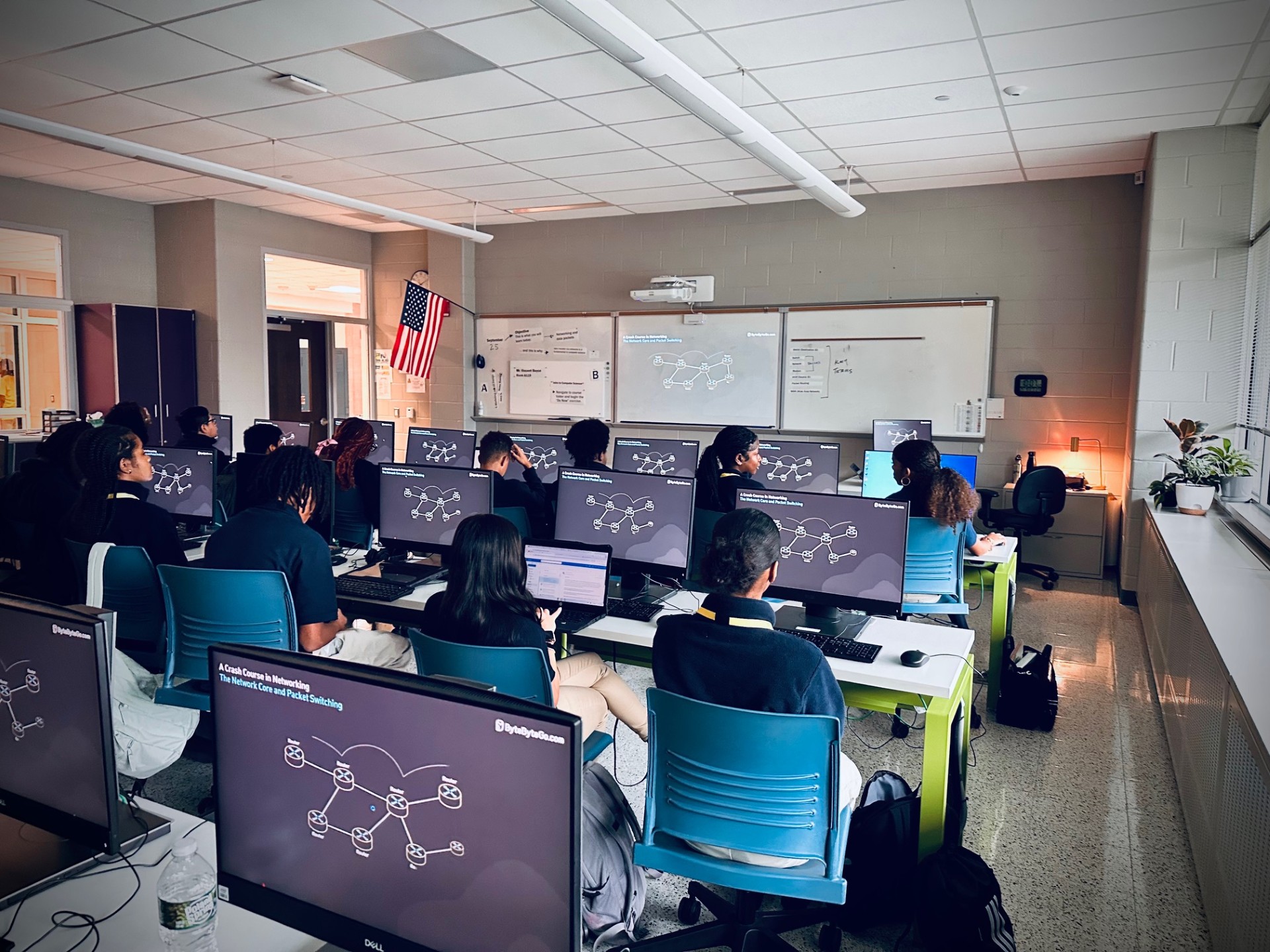 Students working on a research and design exercise in a classroom